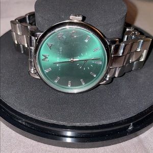 Silver and Green Face Marc Jacobs watch.